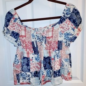 A brand new colorful top, size large